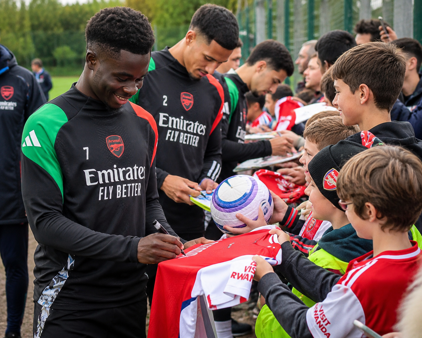 Arsenal Players Delight Young Fans with Autograph Session Ahead of Champions League Final